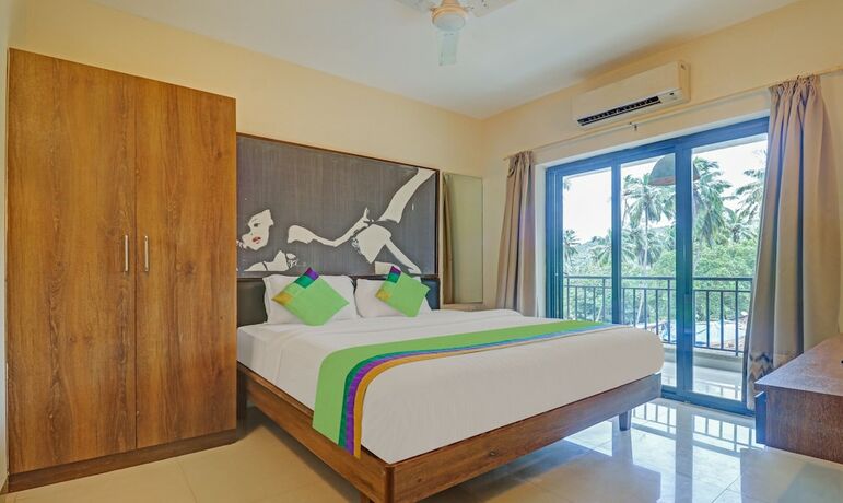 Imagen de la habitación del Hotel Treebo Trend Aquamarine Arpora. Foto 19