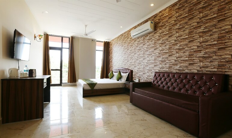 Imagen de la habitación del Hotel Treebo Trend Blessing Bells. Foto 23