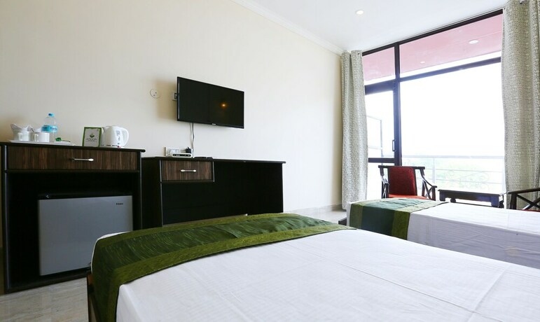 Imagen de la habitación del Hotel Treebo Trend Blessing Bells. Foto 24