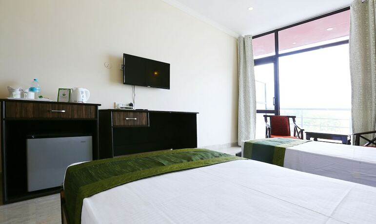 Imagen de la habitación del Hotel Treebo Trend Blessing Bells. Foto 25