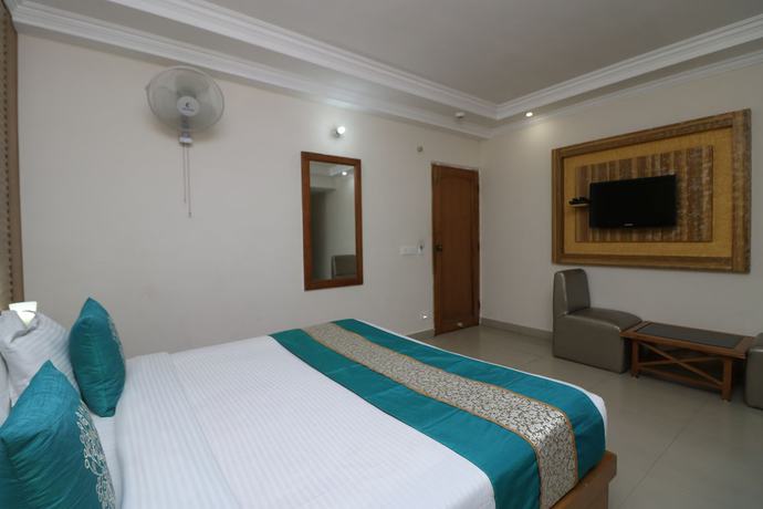 Imagen de la habitación del Hotel Treebo Trend Calista. Foto 9