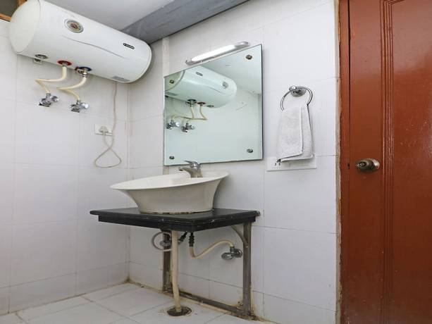 Imagen de la habitación del Hotel Treebo Trend Calista. Foto 19