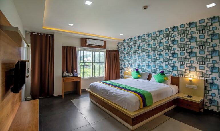 Imagen de la habitación del Hotel Treebo Trend Chembra Residency. Foto 17