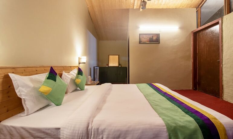 Imagen de la habitación del Hotel Treebo Trend Daak Bangla Retreat. Foto 19