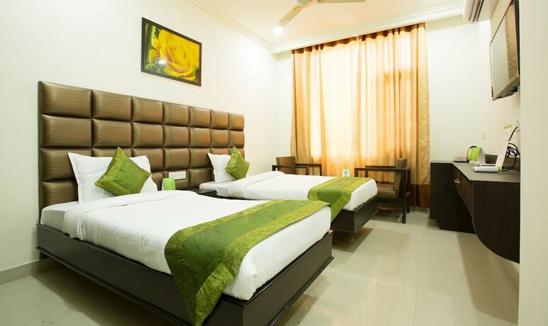 Imagen de la habitación del Hotel Treebo Trend Dee Intercontinental Near The Golden Temple. Foto 23