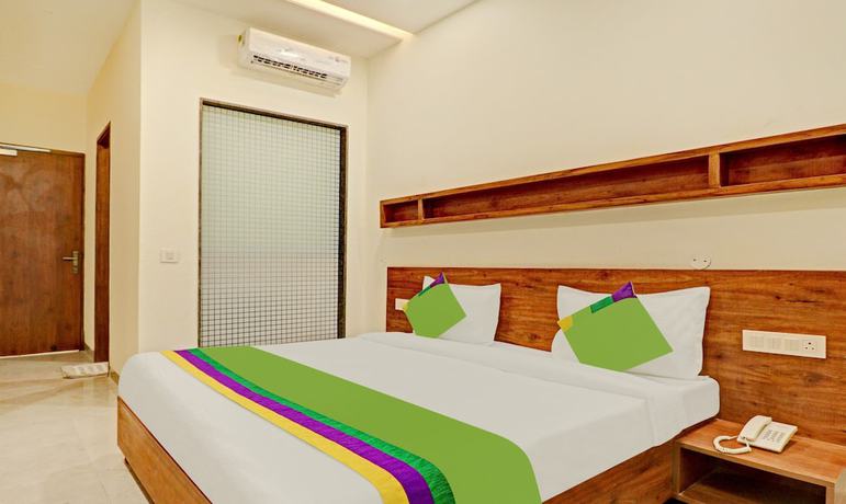 Imagen de la habitación del Hotel Treebo Trend Delmont. Foto 10