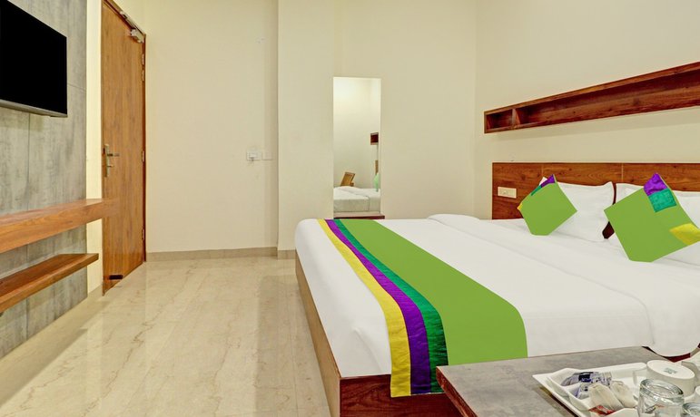 Imagen de la habitación del Hotel Treebo Trend Delmont. Foto 11