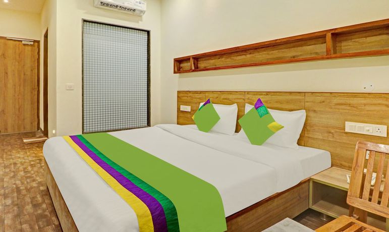 Imagen de la habitación del Hotel Treebo Trend Delmont. Foto 15