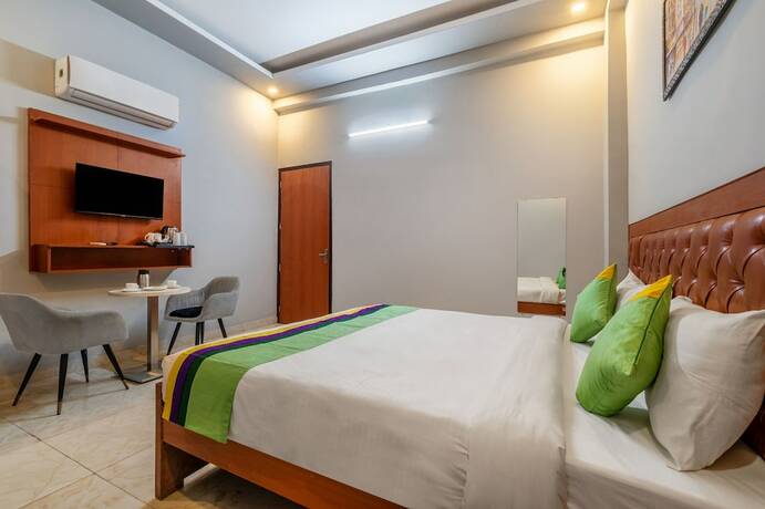 Imagen de la habitación del Hotel Treebo Trend Expo Mart Inn. Foto 17