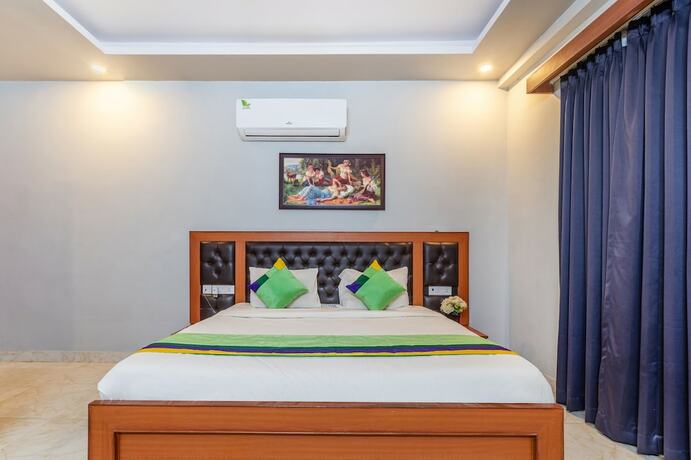 Imagen de la habitación del Hotel Treebo Trend Expo Mart Inn. Foto 19