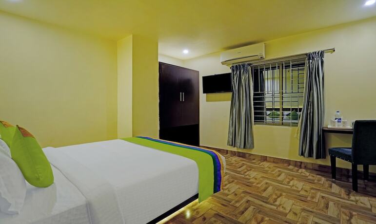 Imagen de la habitación del Hotel Treebo Trend Golden Nest. Foto 19