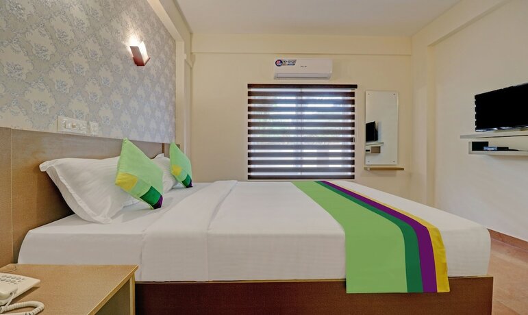 Imagen de la habitación del Hotel Treebo Trend Golden Terminal Cochin Airport. Foto 18