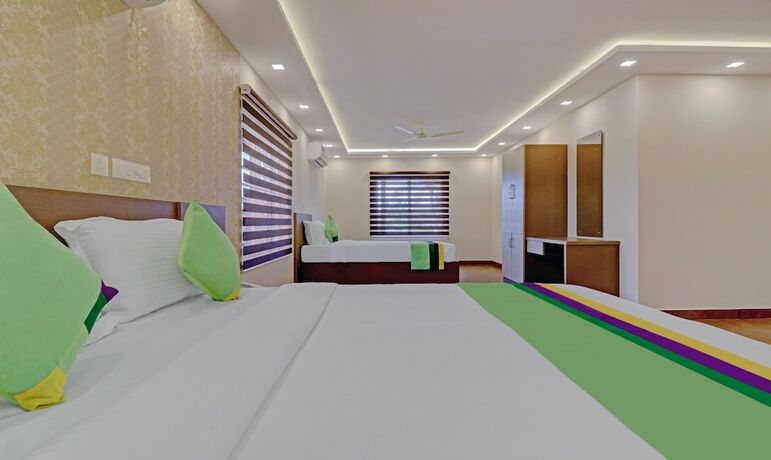 Imagen de la habitación del Hotel Treebo Trend Golden Terminal Cochin Airport. Foto 19