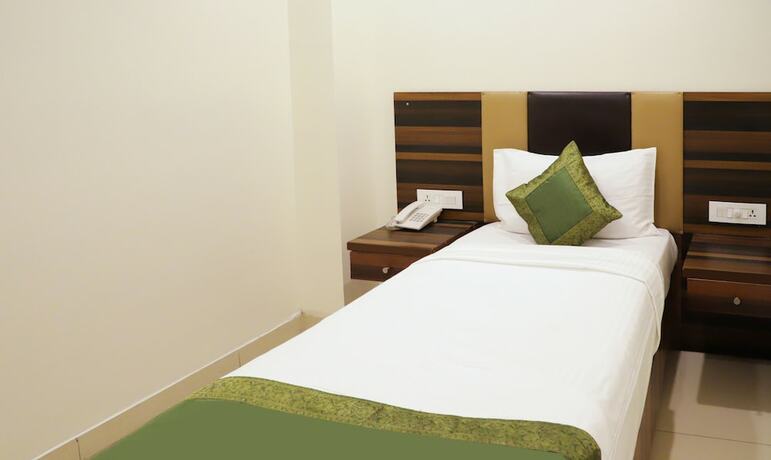 Imagen de la habitación del Hotel Treebo Trend Grand Horizon. Foto 19