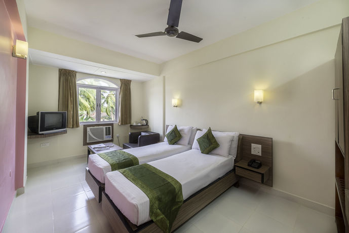 Imagen de la habitación del Hotel Treebo Trend Green Park. Foto 10