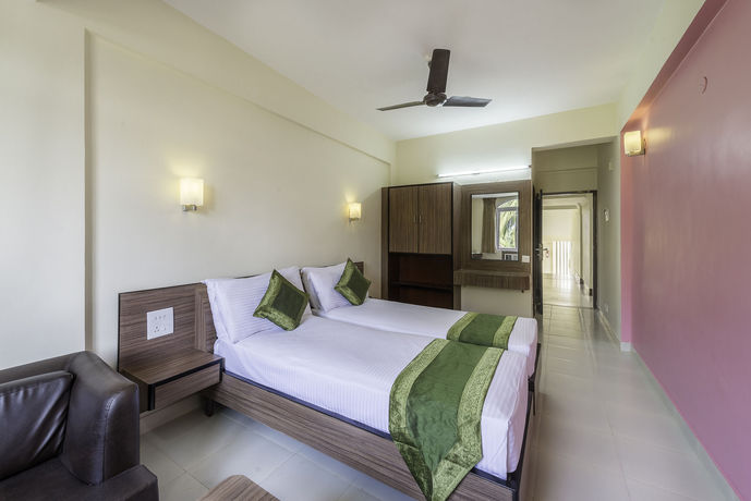 Imagen de la habitación del Hotel Treebo Trend Green Park. Foto 11