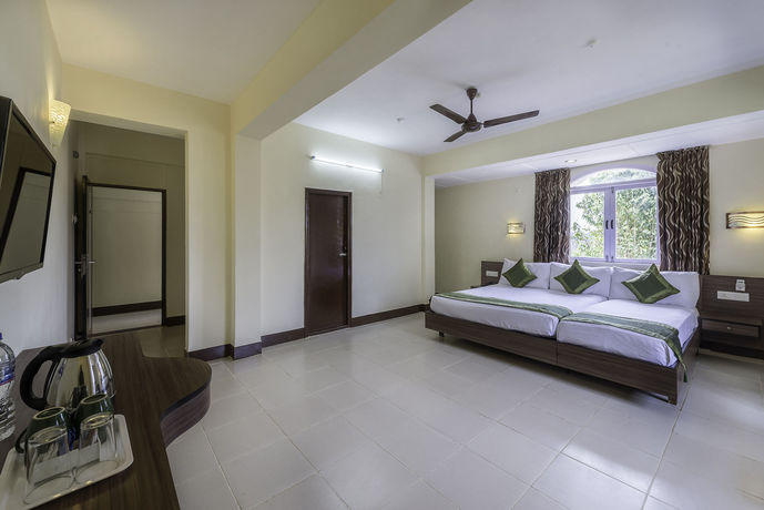 Imagen de la habitación del Hotel Treebo Trend Green Park. Foto 12
