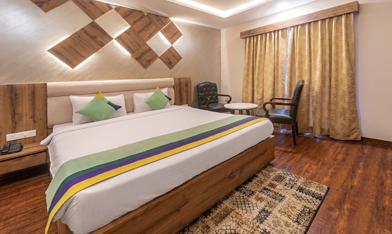 Imagen de la habitación del Hotel Treebo Trend Greenland Resort. Foto 11