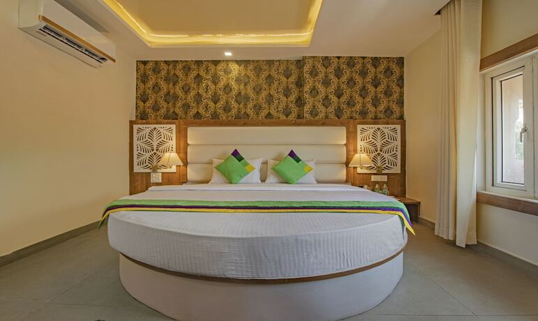 Imagen de la habitación del Hotel Treebo Trend Haveli Resort Roots. Foto 16