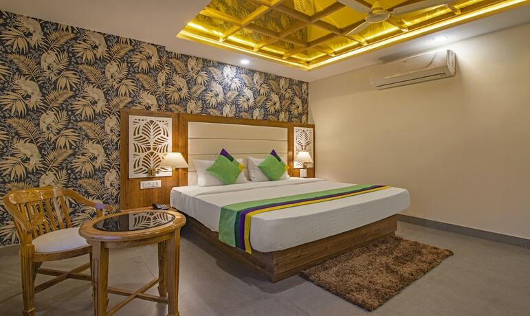 Imagen de la habitación del Hotel Treebo Trend Haveli Resort Roots. Foto 17