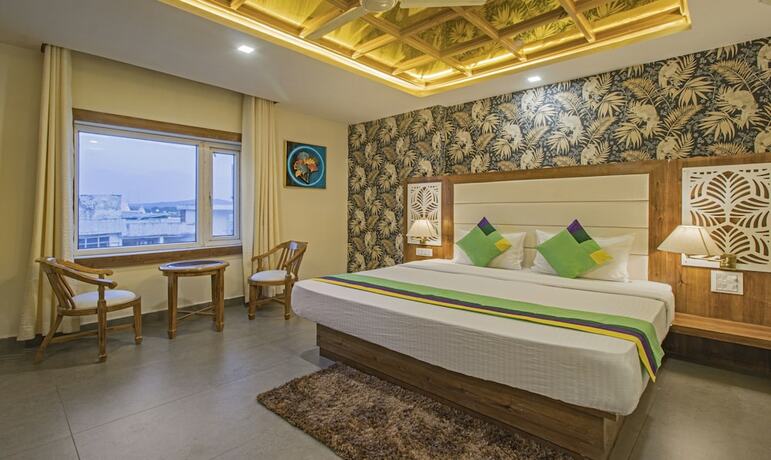 Imagen de la habitación del Hotel Treebo Trend Haveli Resort Roots. Foto 18