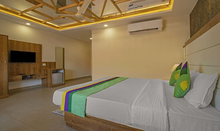 Imagen de la habitación del Hotel Treebo Trend Haveli Resort Roots. Foto 20
