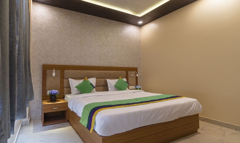 Imagen de la habitación del Hotel Treebo Trend Heaven Grand Ayodhya. Foto 7