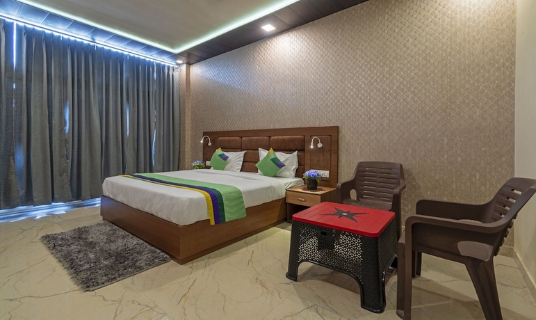 Imagen de la habitación del Hotel Treebo Trend Heaven Grand Ayodhya. Foto 8