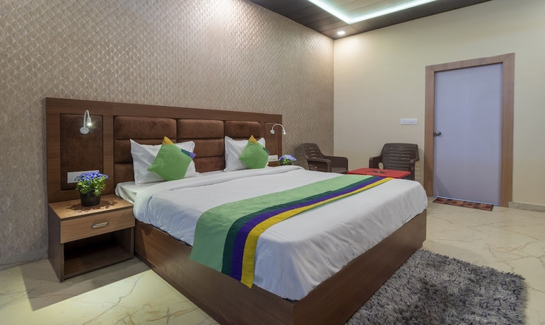 Imagen de la habitación del Hotel Treebo Trend Heaven Grand Ayodhya. Foto 9