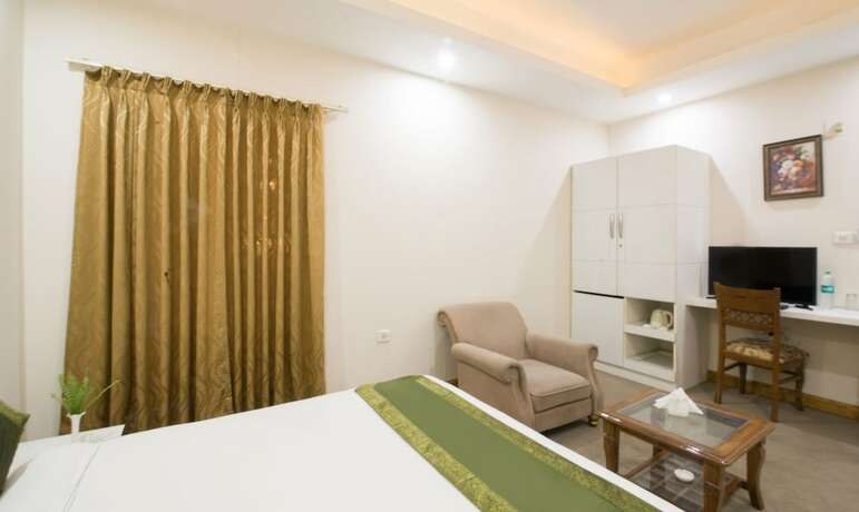 Imagen de la habitación del Hotel Treebo Trend House Inn. Foto 20