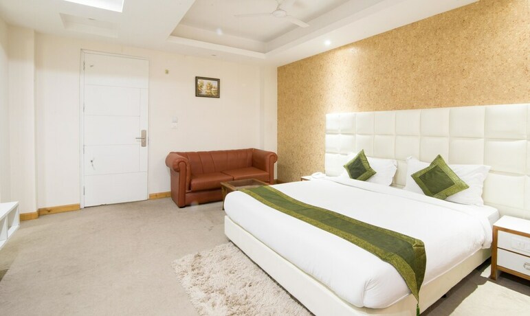 Imagen de la habitación del Hotel Treebo Trend House Inn. Foto 26