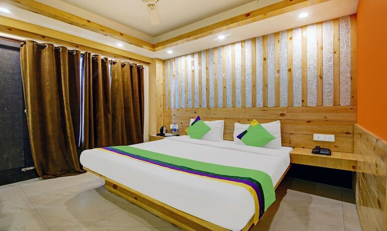 Imagen de la habitación del Hotel Treebo Trend Howard International. Foto 13