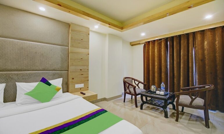 Imagen de la habitación del Hotel Treebo Trend Howard International. Foto 15