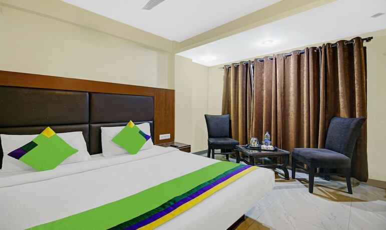 Imagen de la habitación del Hotel Treebo Trend Howard International. Foto 16