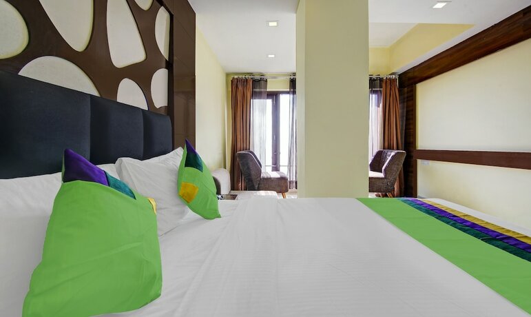 Imagen de la habitación del Hotel Treebo Trend Howard International. Foto 17