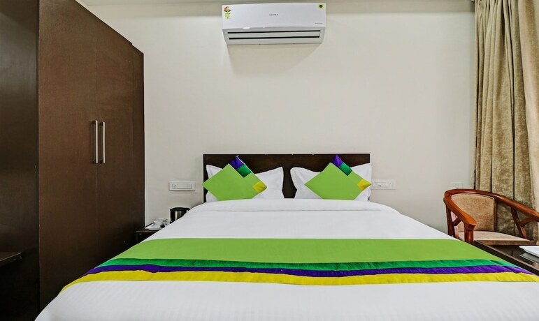Imagen de la habitación del Hotel Treebo Trend Kamron Regency. Foto 20