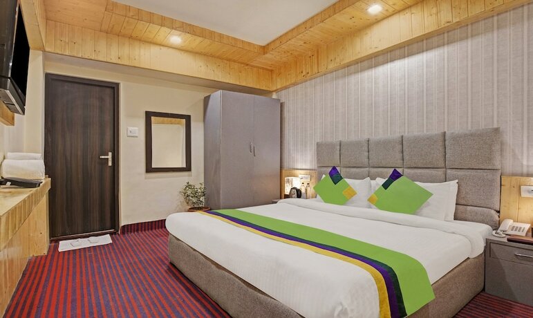 Imagen de la habitación del Hotel Treebo Trend Kosmos Anamika, Nainital. Foto 17