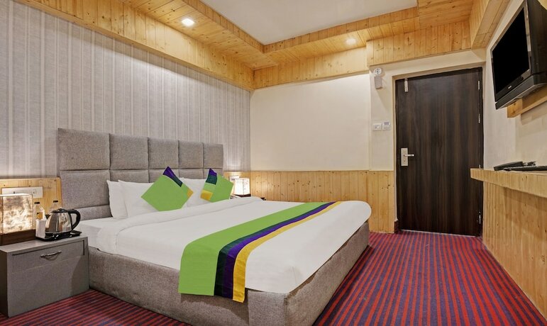 Imagen de la habitación del Hotel Treebo Trend Kosmos Anamika, Nainital. Foto 18