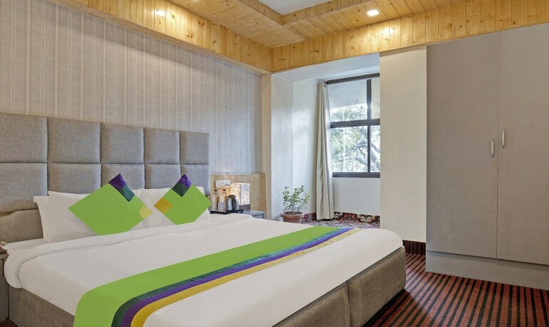Imagen de la habitación del Hotel Treebo Trend Kosmos Anamika, Nainital. Foto 19