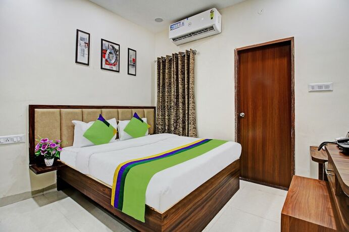 Imagen de la habitación del Hotel Treebo Trend Krishna Regency. Foto 18