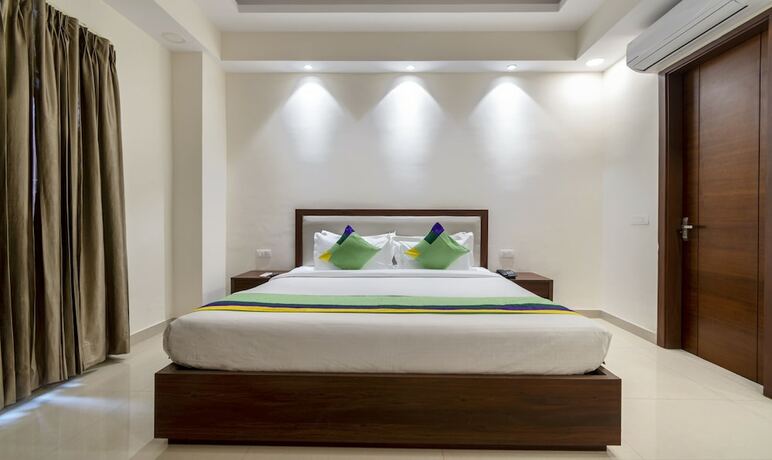 Imagen de la habitación del Hotel Treebo Trend La Mirage Suites. Foto 15