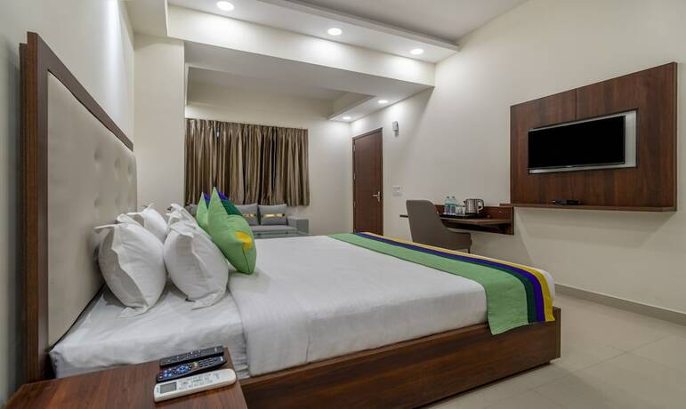 Imagen de la habitación del Hotel Treebo Trend La Mirage Suites. Foto 17