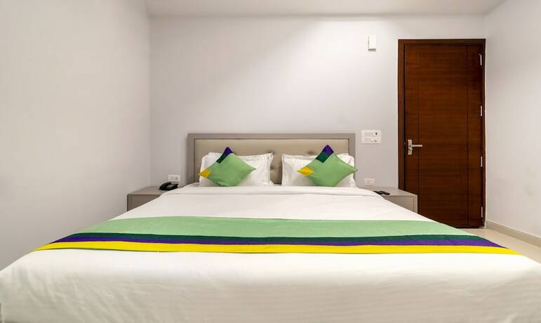 Imagen de la habitación del Hotel Treebo Trend La Mirage Suites. Foto 18