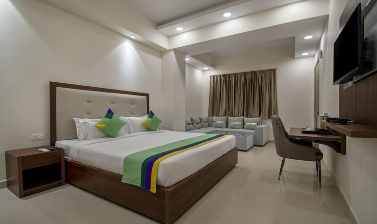 Imagen de la habitación del Hotel Treebo Trend La Mirage Suites. Foto 19
