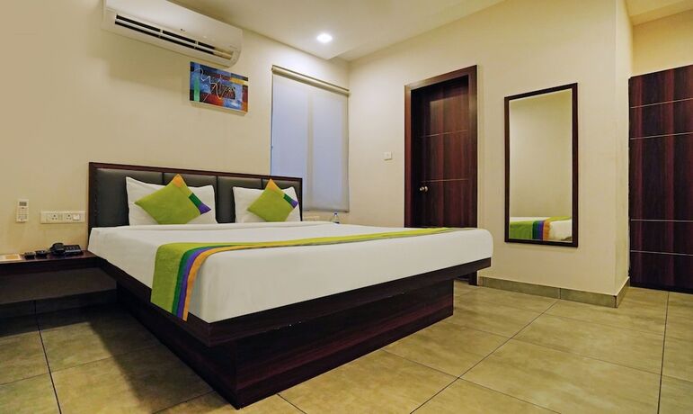 Imagen de la habitación del Hotel Treebo Trend Lazystay Grand. Foto 15