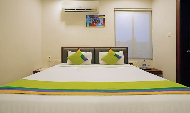 Imagen de la habitación del Hotel Treebo Trend Lazystay Grand. Foto 16