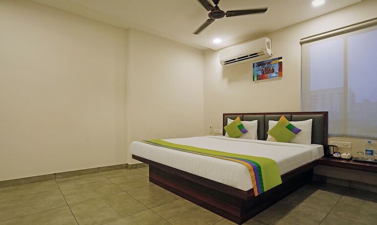 Imagen de la habitación del Hotel Treebo Trend Lazystay Grand. Foto 17