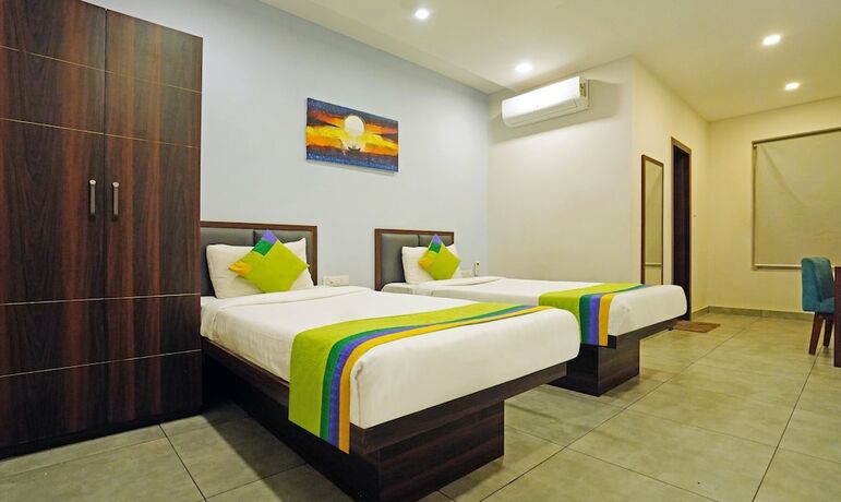 Imagen de la habitación del Hotel Treebo Trend Lazystay Grand. Foto 20