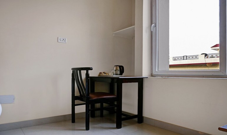 Imagen de la habitación del Hotel Treebo Trend Little Budhha. Foto 5