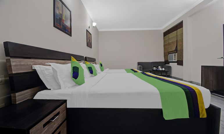Imagen de la habitación del Hotel Treebo Trend Maharaja Residency. Foto 3